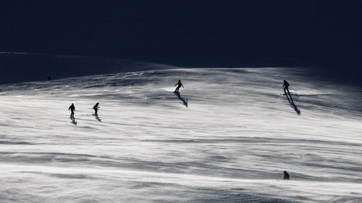 Snowboarder and Skiing at Mount Hutt